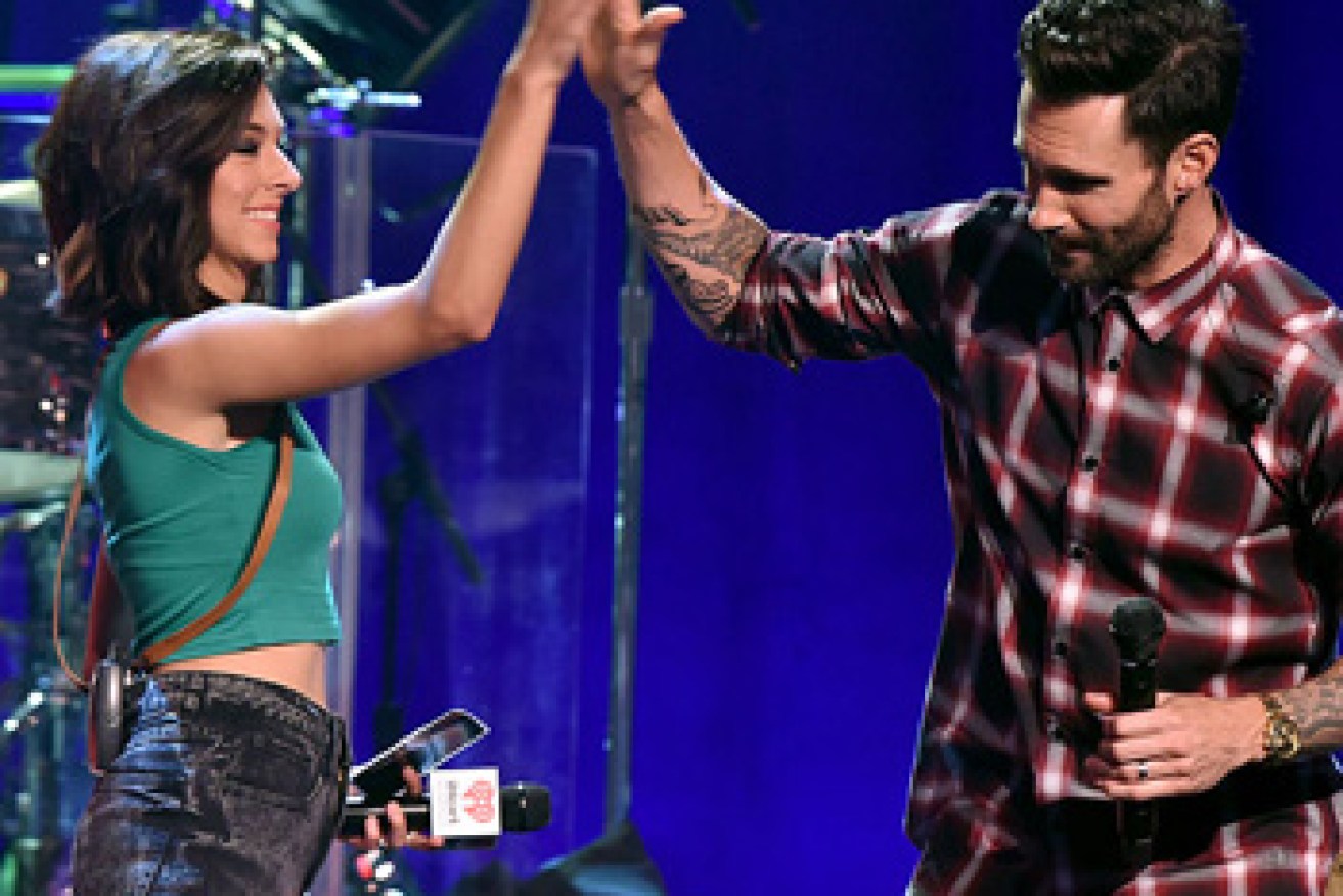 Grimmie with Adam Levine at an album release party in 2014. Photo: Getty