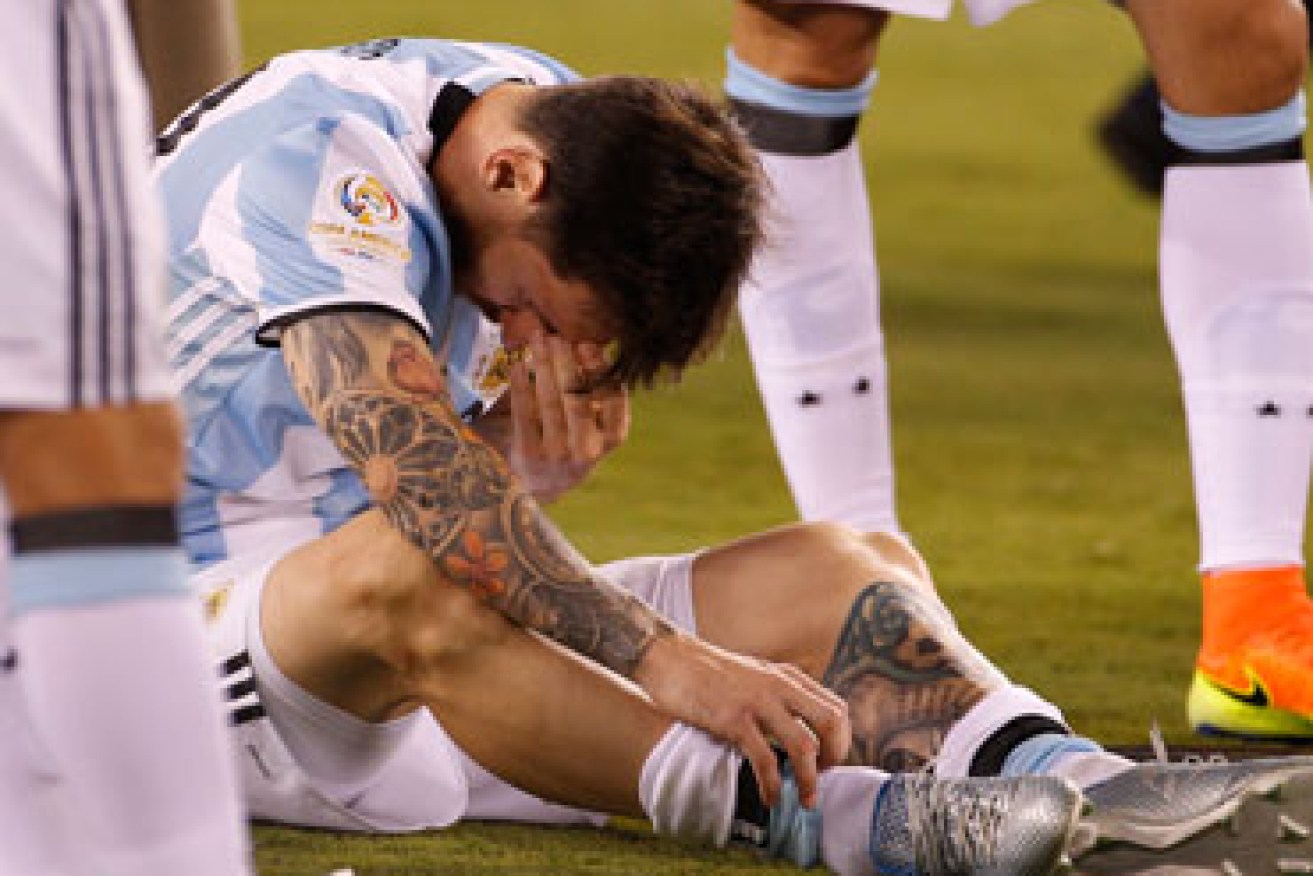 Messi fights back tears after the loss. Photo: Getty