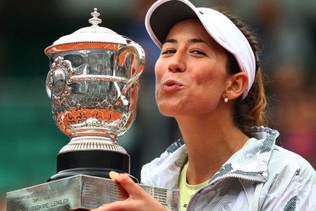 Muguruza poised to rule after French Open victory