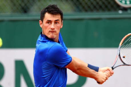Tomic advances, Kyrgios made to wait at Queens