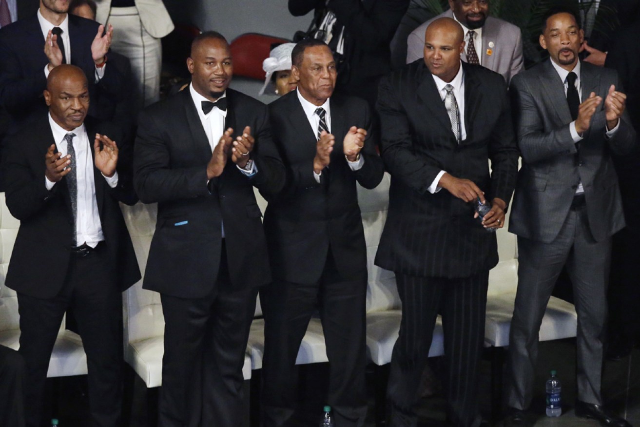 Pallbearers Mike Tyson, left, Lennox Lewis, Will Smith, and Mike Moorer. AP