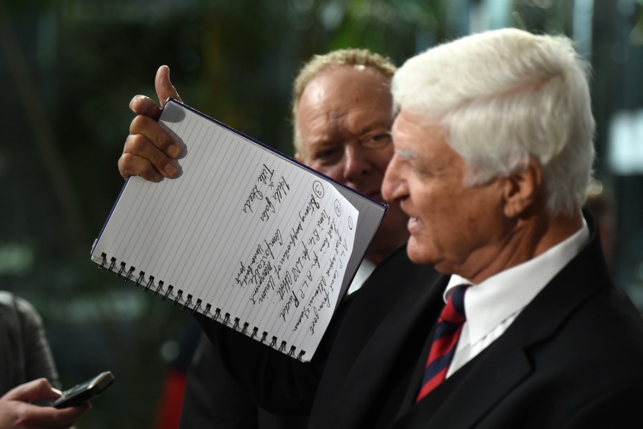 Quick photographers snapped Katter's speech notes, which included three dot points. Photo: AAP