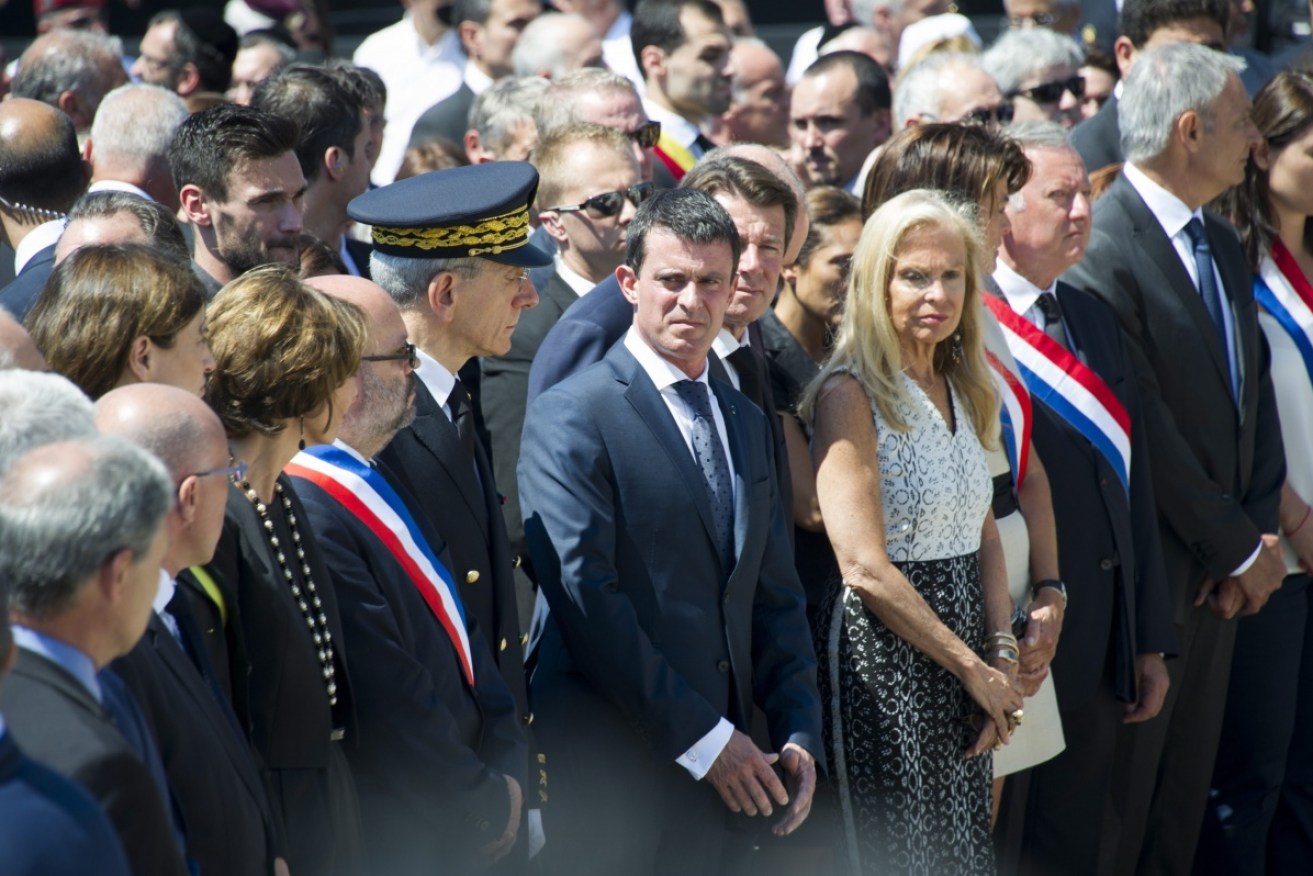 French PM Manuel Valls take part in a minute's silence along the Promenade des Anglais.