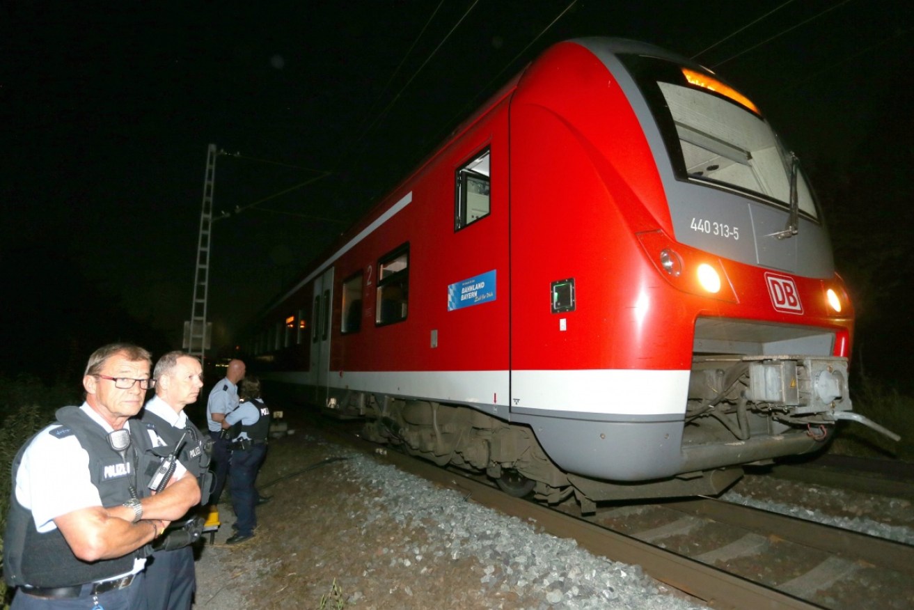 Police at the scene after the train attack.