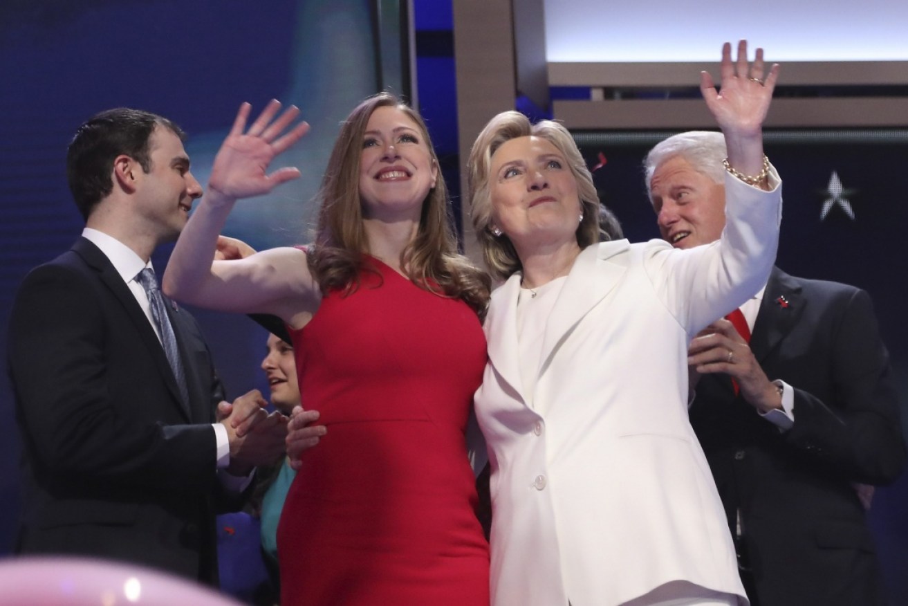 Hillary Clinton and daughter Chelsea Clinton, along with Marc Mezvinsky and former US President Bill Clinton . Photo: AAP