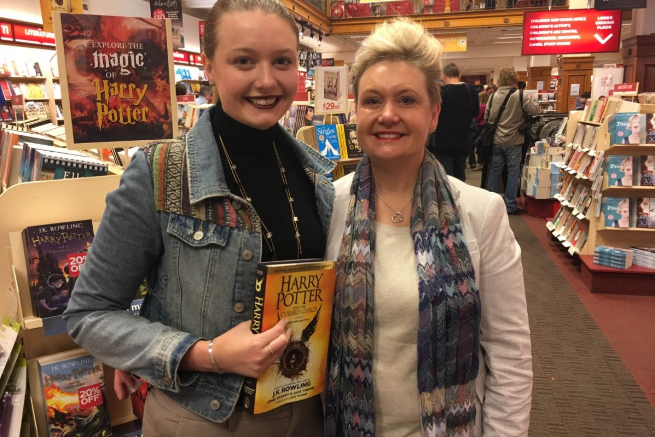 Harry Potter fan Mariette Lewis and her mum Lisa at Dymocks in Sydney. 