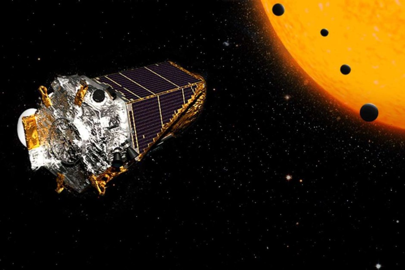 An artist's impression of NASA's Kepler spacecraft discovering the planets.