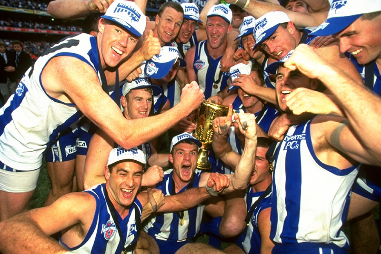 The 1996 team celebrate their grand final win. Photo: Getty