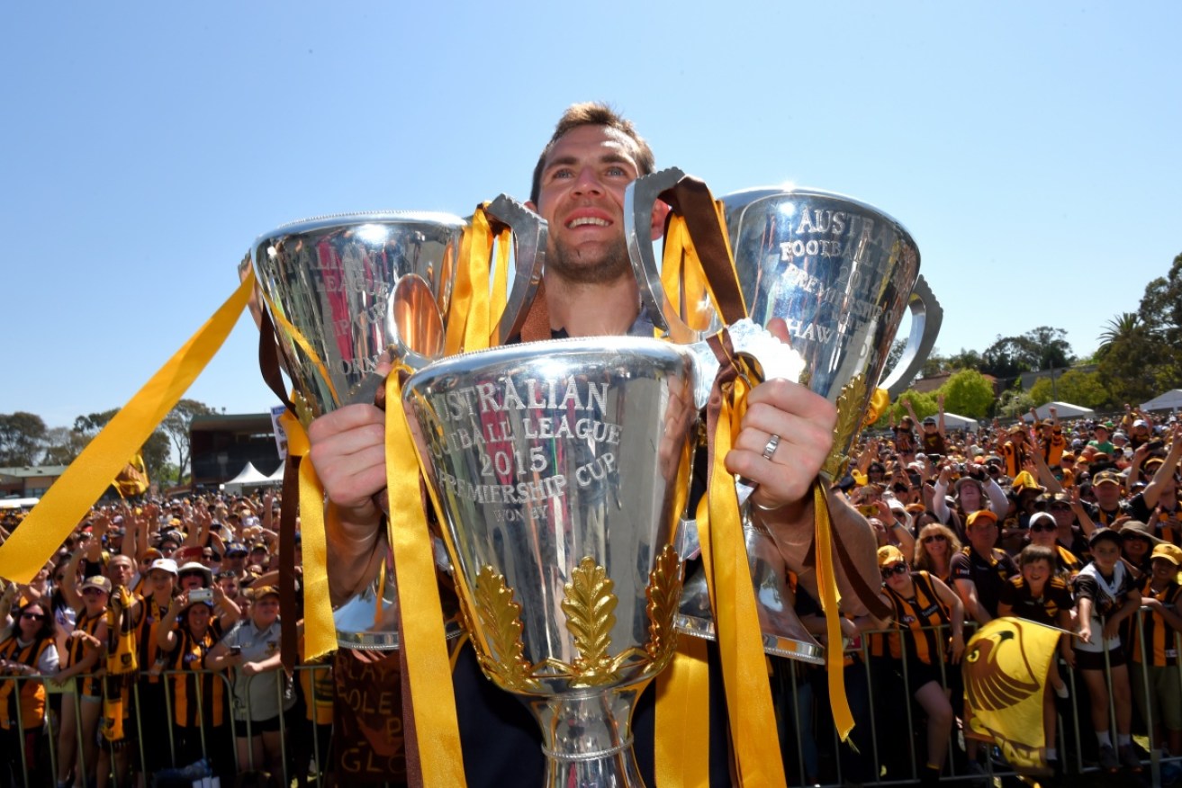 Need a hand? Can Luke Hodge and his Hawks add another trophy to their collection?