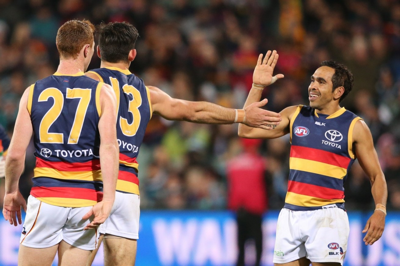 The AFL has been hit by another racism scandal after a banana was thrown at Eddie Betts.