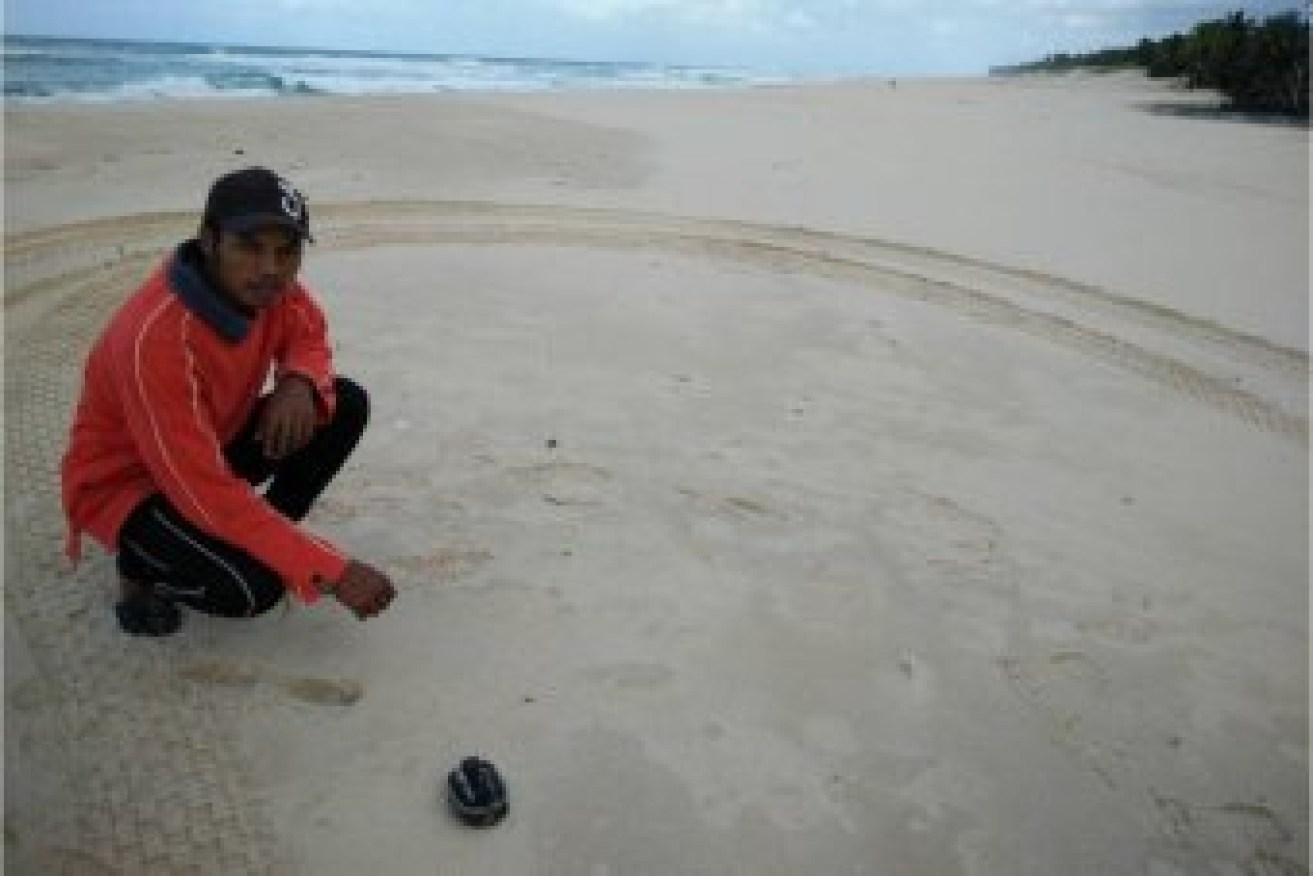 A camera case is found washed up on Riake Beach, Madagascar. 