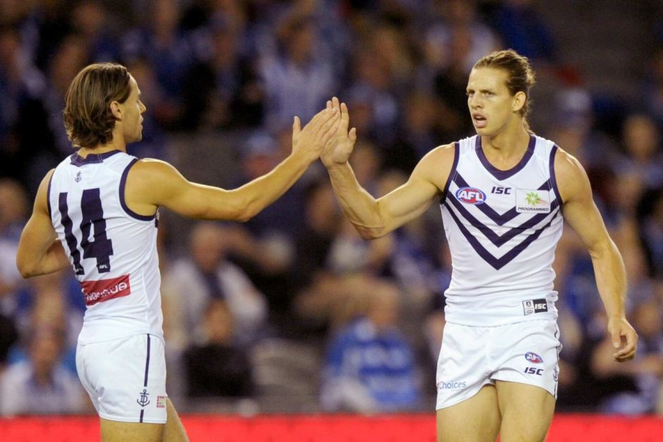Nat Fyfe (r) says he sees his future at the Dockers.