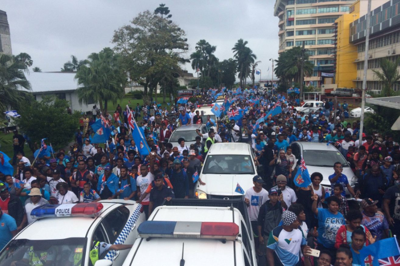 Fans greet Fiji's Olympic gold-medal-winning rugby team on their return from Rio.
