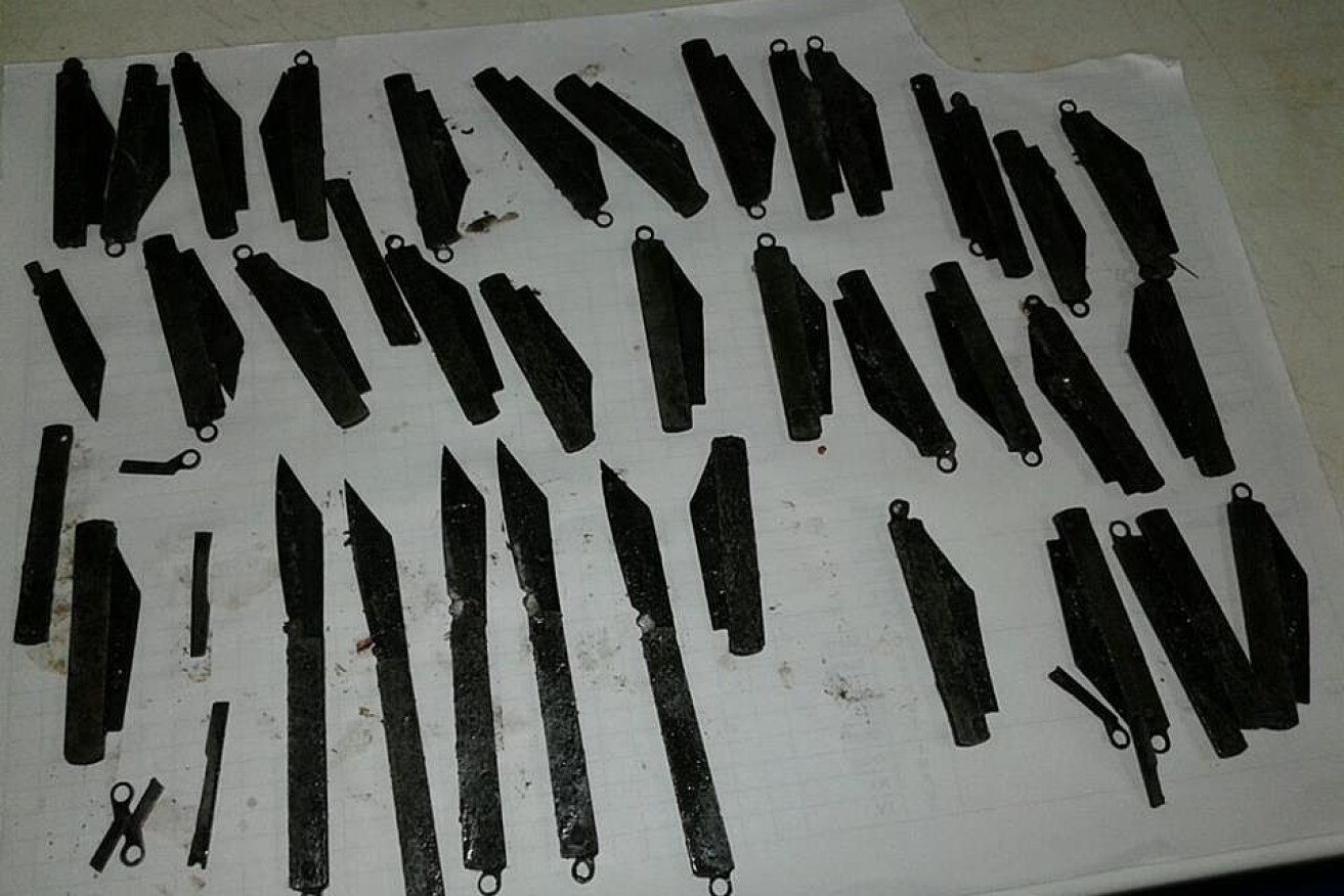 Some of the 40 knives swallowed by the man.