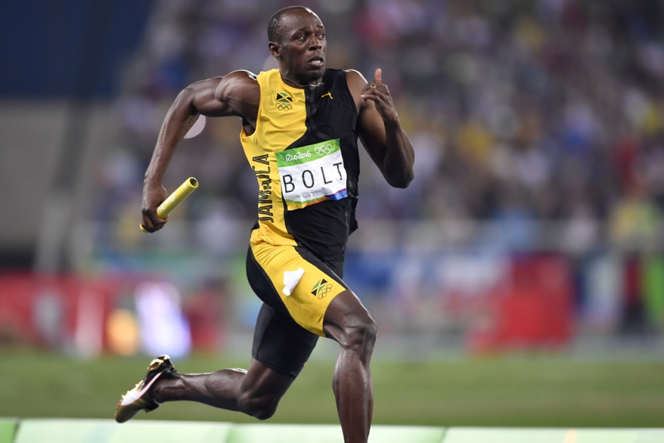 Bolt surges to the finish line. 