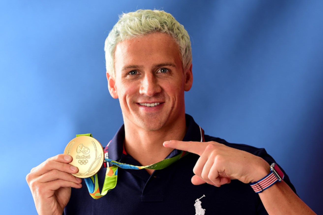 Ryan Lochte with his sixth gold medal – before his world started falling apart.