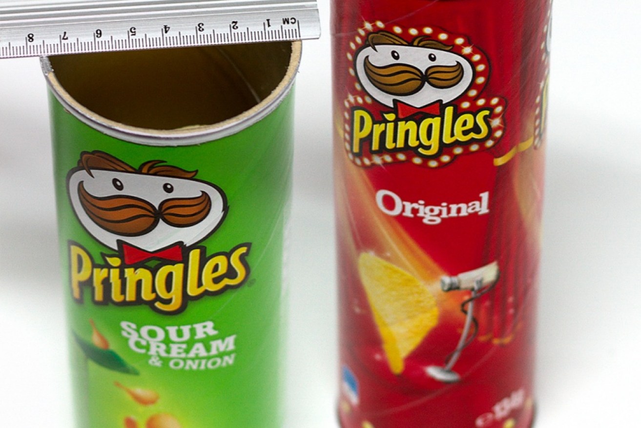The diameter of Pringles' new cans (right) is noticeably smaller. 