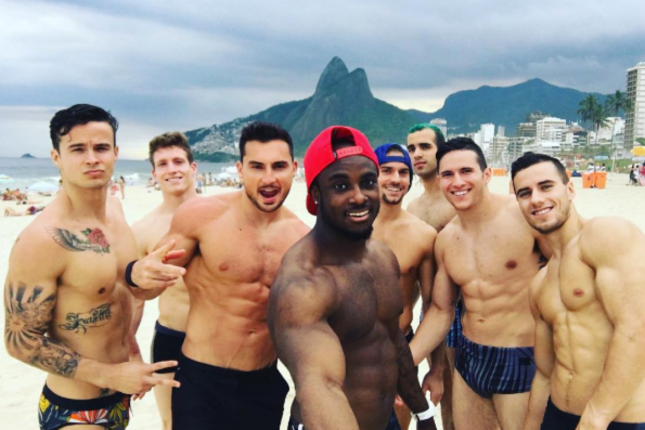 The American men's gymnastics team are using their abs to attract supporters.