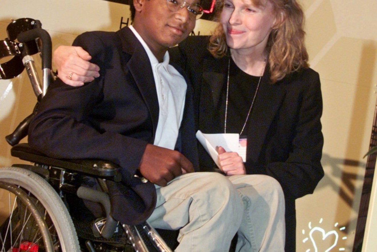 Thaddeus and Mia Farrow at a summit on polio eradication in 2000.