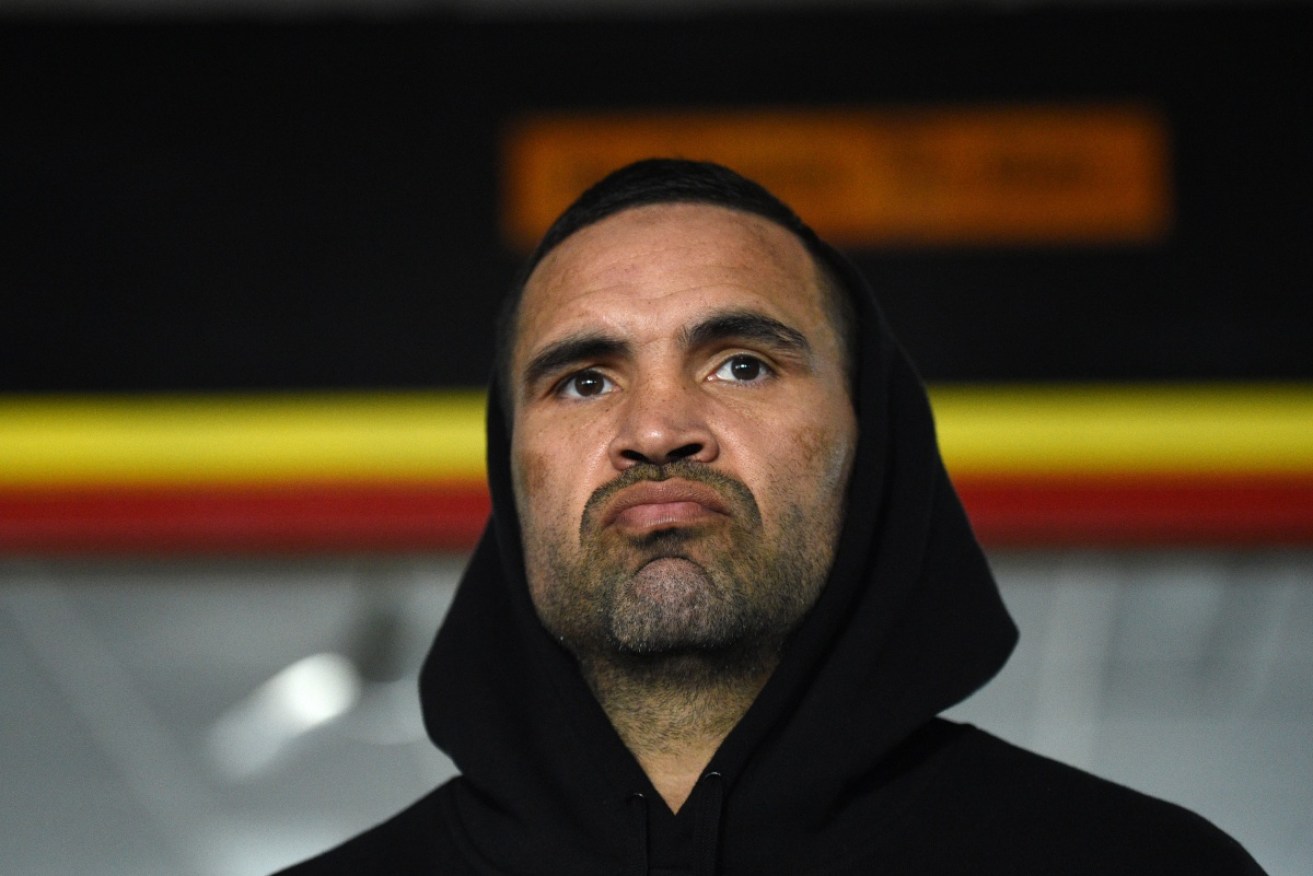 Boxer Anthony Mundine won't stand for the national anthem. 