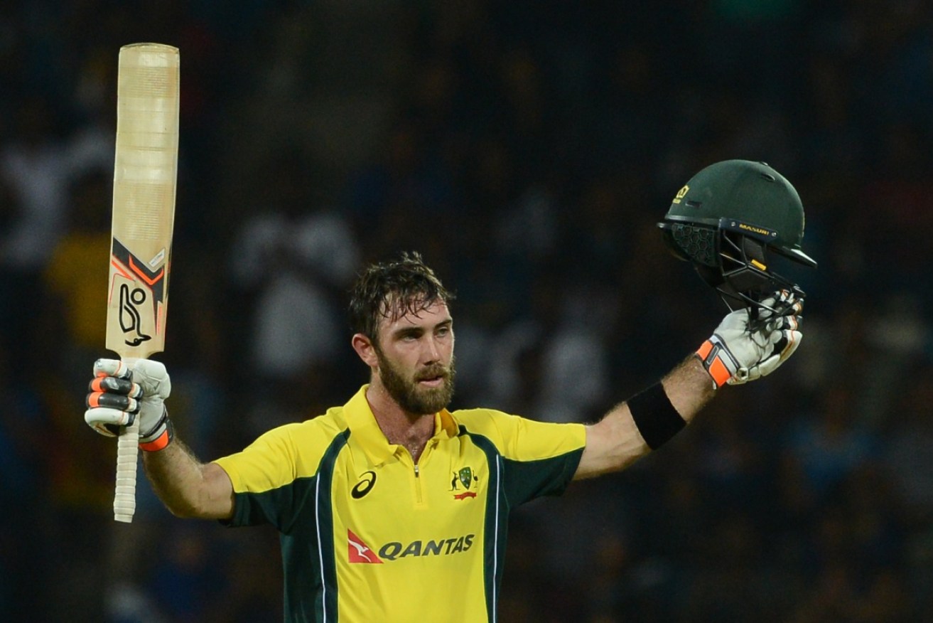 Glenn Maxwell celebrates after scoring a century – he hit nine sixes in a superb 145 not out.