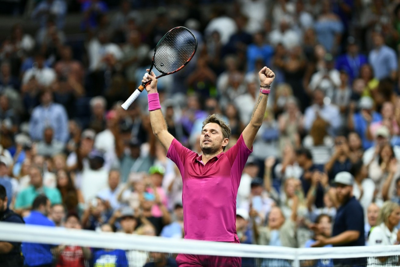 Stan Wawrinka celebrates after defeating Novak Djokovic at the end of their 2016 US Open Men's Singles final match.
