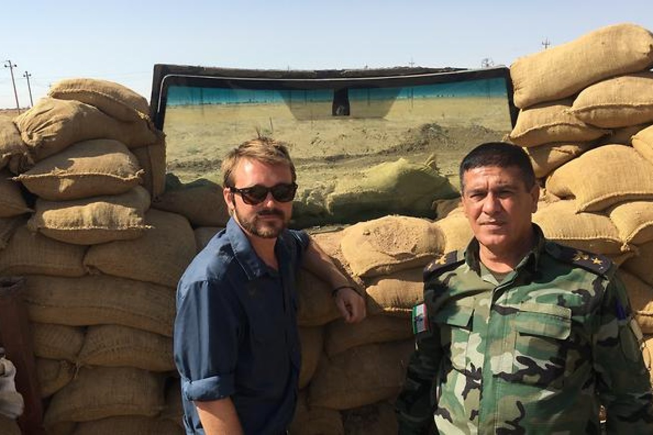 Former Liberal National Party MP Wyatt Wyatt Roy with a member of the Peshmerga in Sinjar area.