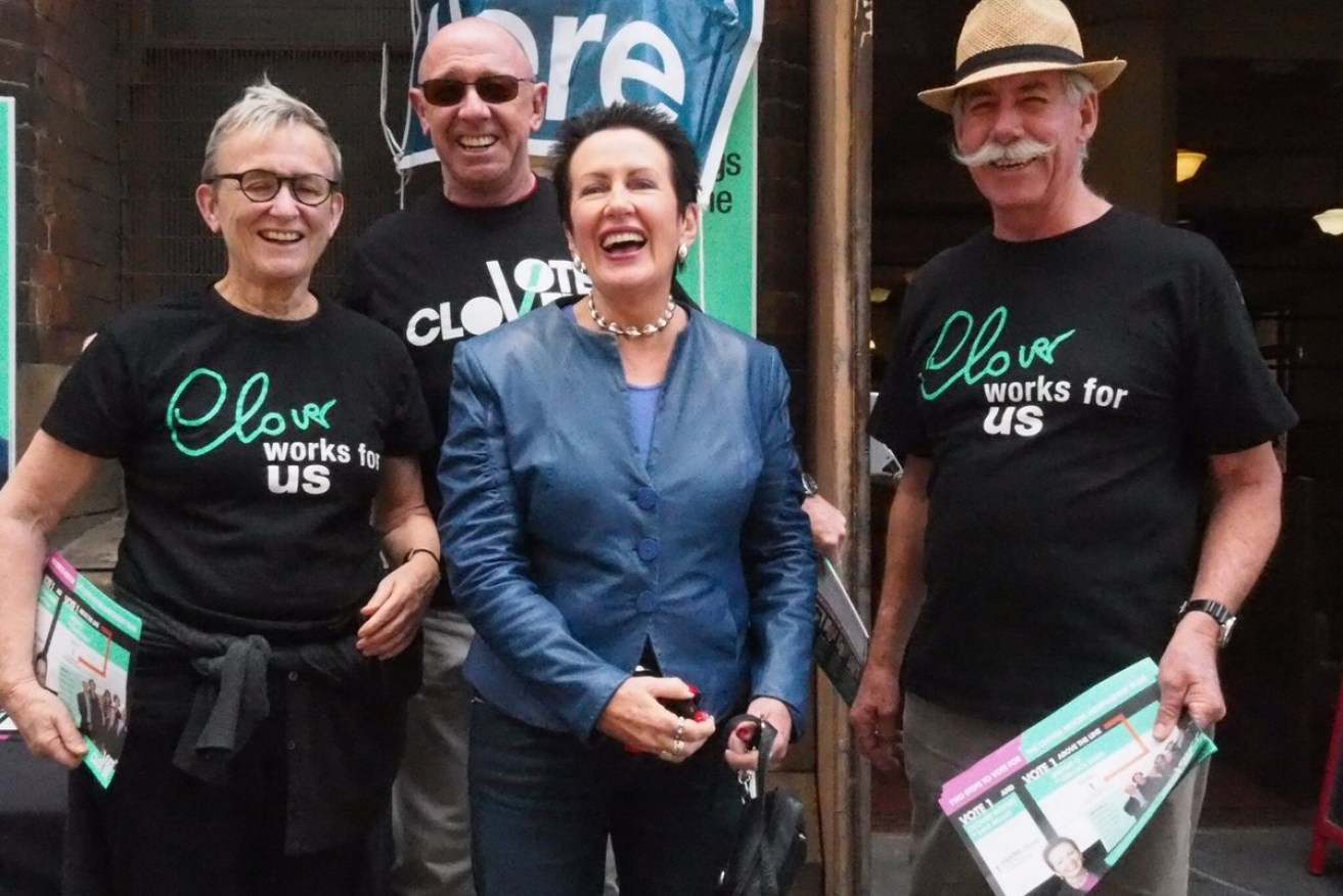 Clover Moore (centre) trounced her opponents to win a record fourth term in Sydney's top job. 