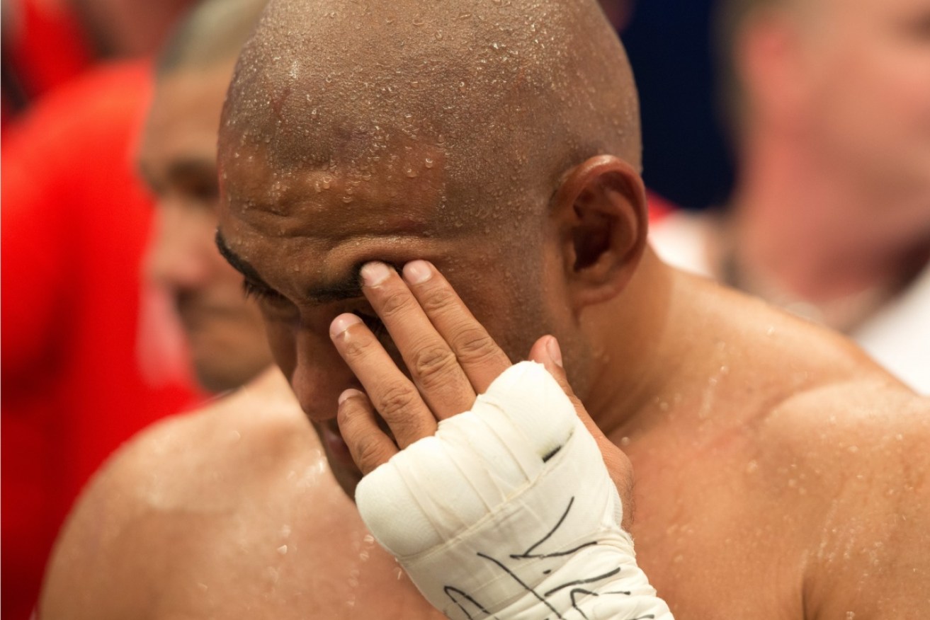 Alex Leapai was ringside, but could do little to help.  