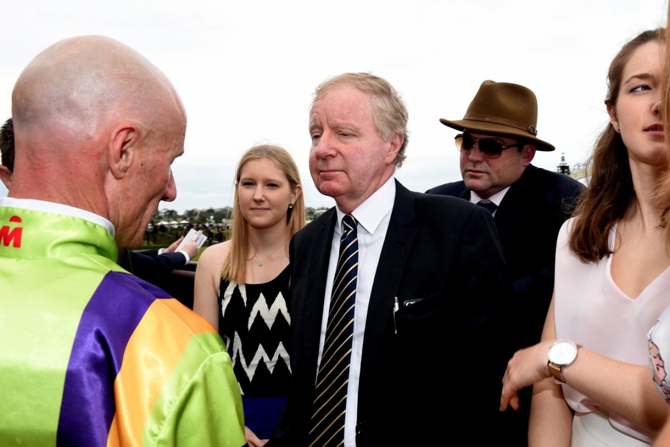 Racing Victoria Chairman David Moodie is under investigation by the Victorian Racing Integrity Commissioner Sal Perna.