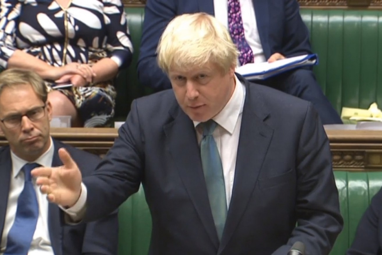 Foreign Secretary Boris Johnson in the House of Commons, where he called for protests outside the Russian embassy. 