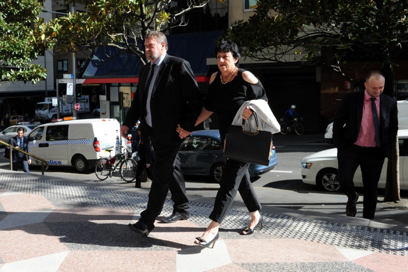 Greg, Virginia and Jason Hughes, the parents and brother of Phillip Hughes, arrive at court on Friday.