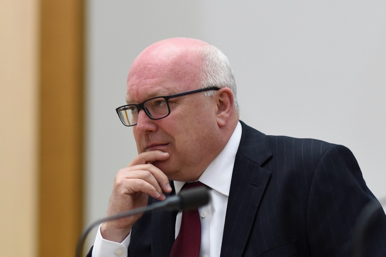 Attorney-General George Brandis appears before a Senate inquiry at Parliament House in Canberra.