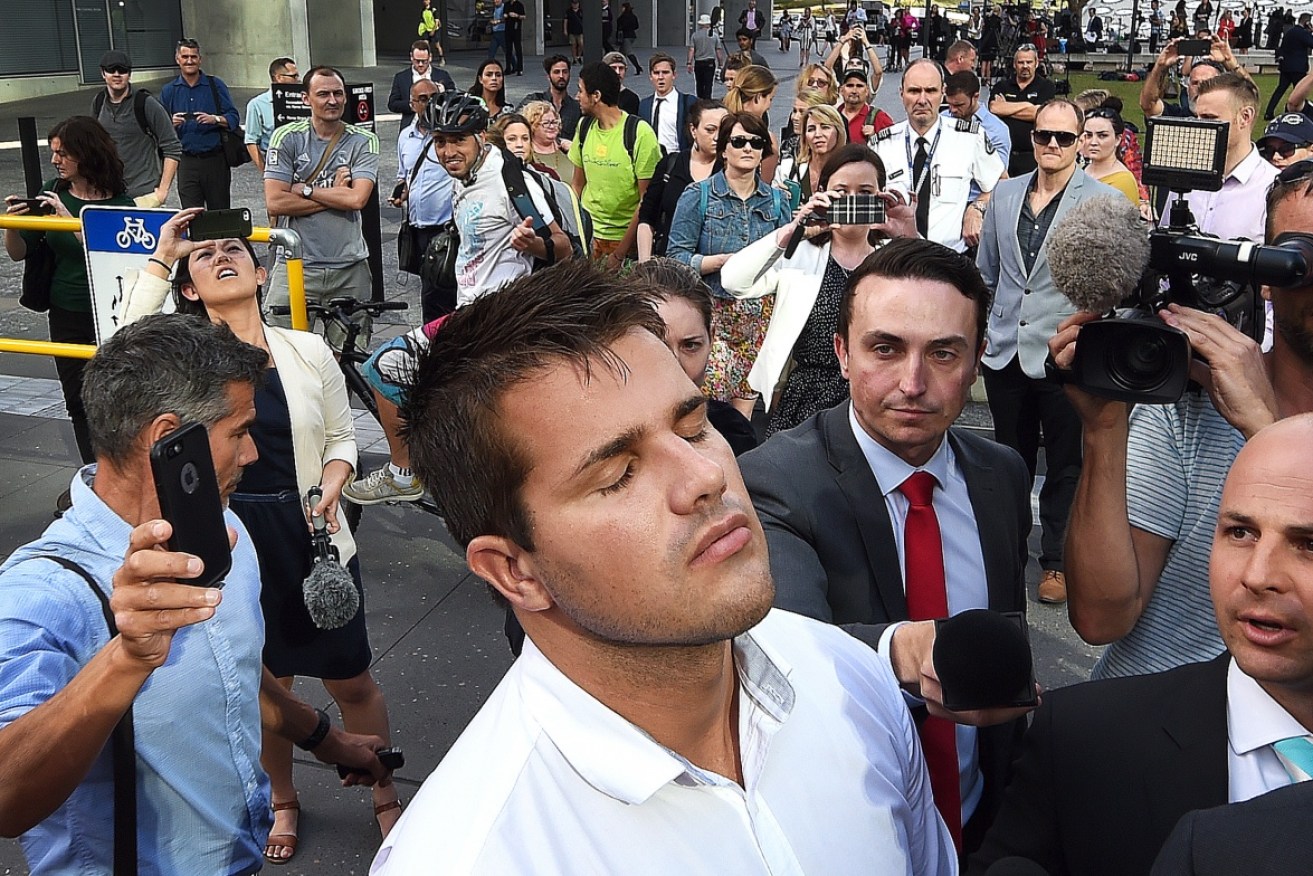 Gable Tostee leaves court after being found not guilty of murder or manslaughter.