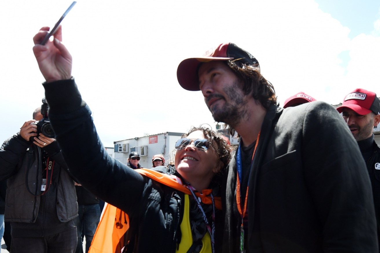 Cover blown: fans spot Reeves at Phillip Island. 