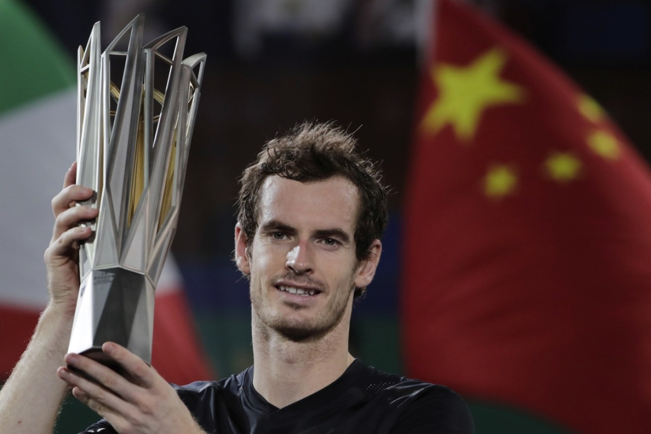 Andy Murray holds up his trophy after defeating Roberto Bautista Agut in the Shanghai final.