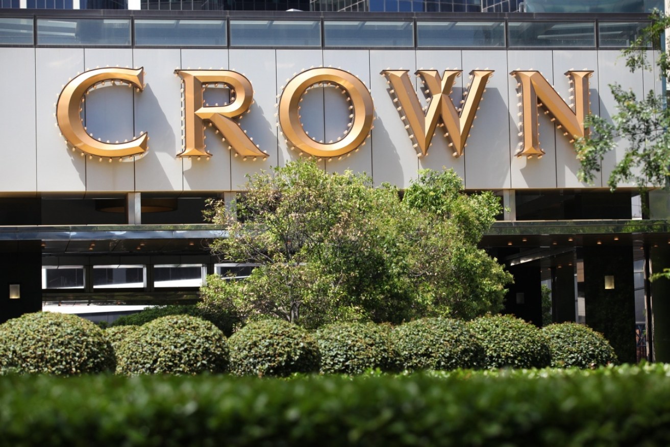 Crown is alleged to have not  done enough to tell shareholders about its activities in China.