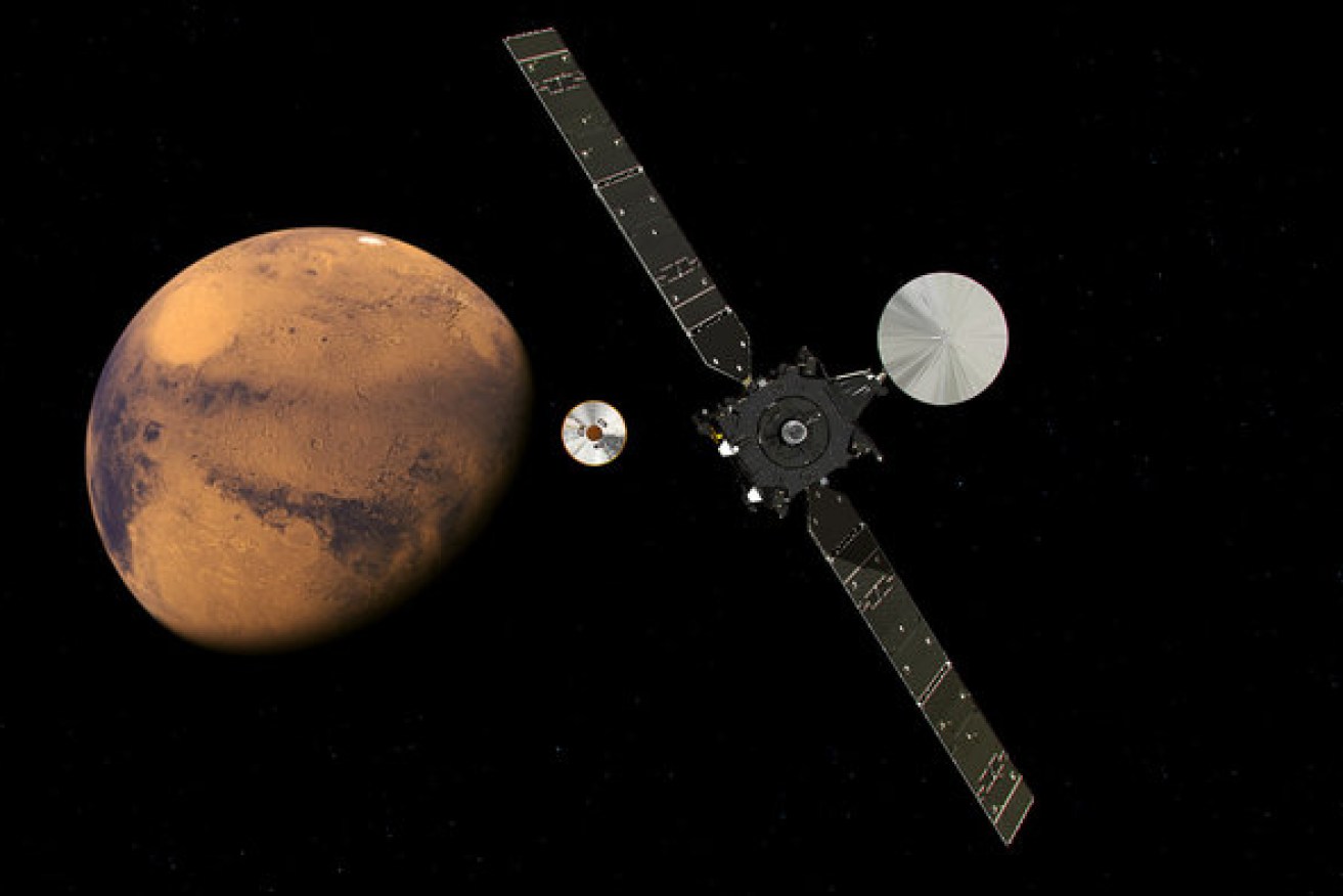 The Mars lander approaching the red planet. 