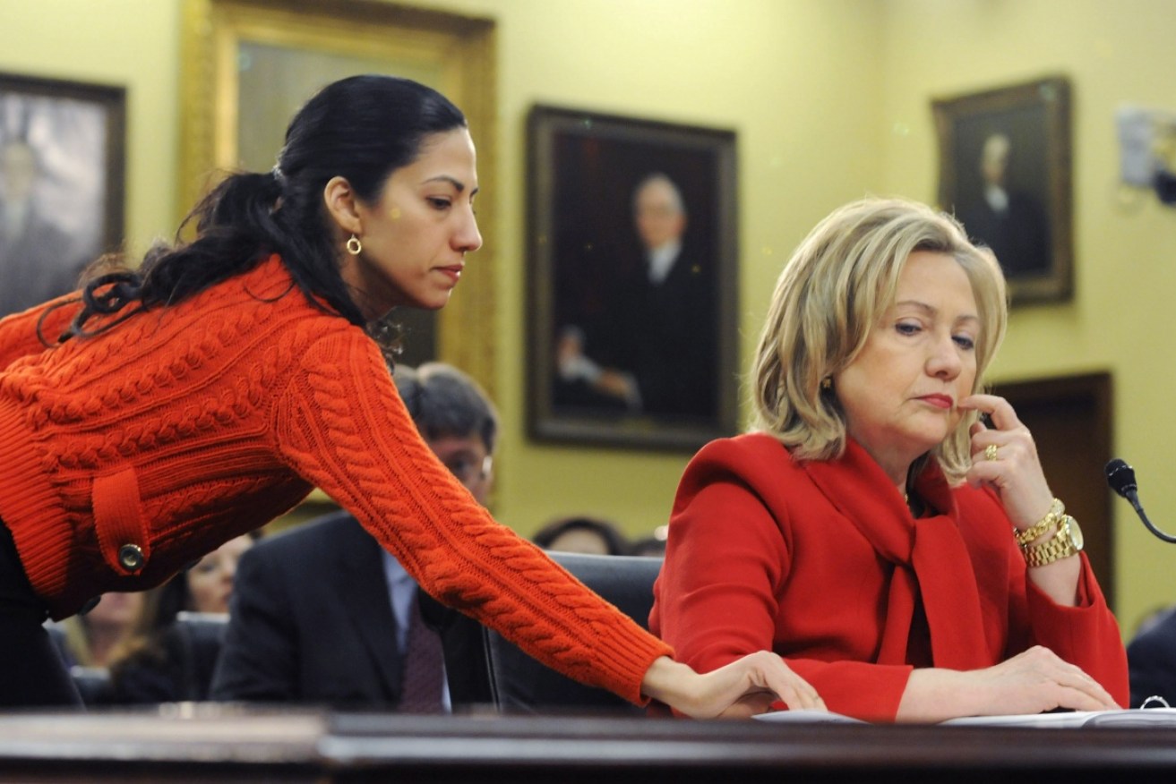 Hillary Clinton's campaign has confirmed she will "stand by" her closest aide Huma Abedin.