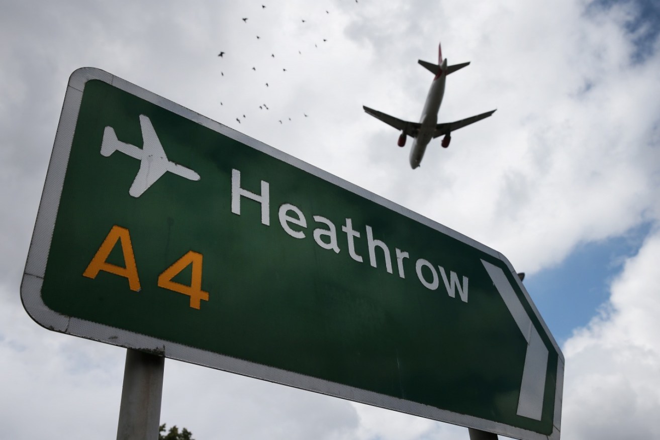 UK police have arrested a man after traces of uranium were discovered in a cargo package at London's Heathrow Airport.