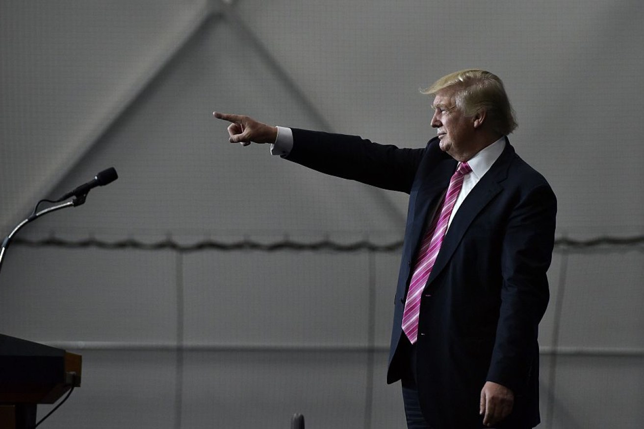 Trump points to the crowd after a rally in Manheim, Pennsylvania. 