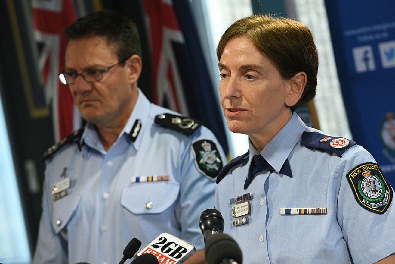 New South Wales Deputy Police Commissioner Catherine Burn (R) and Australian Federal Police Deputy Commissioner Michael Phelan.