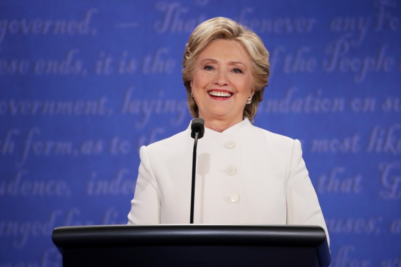 Hillary Clinton spent the third presidential debate smiling and nodding.