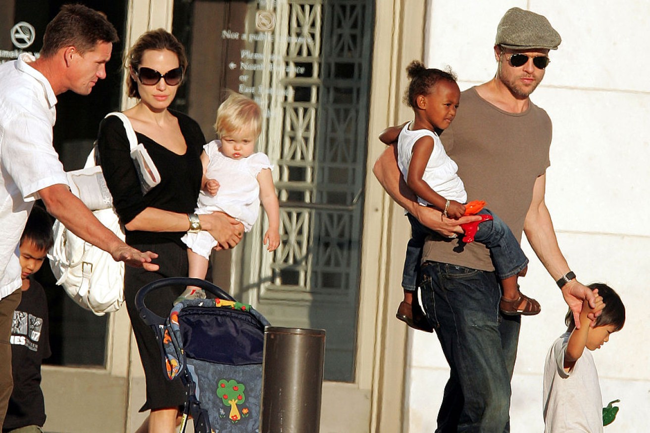 After an acrimonious split punctuated by leaks and accusations, Angeline Jolie claims she and Brad are still a family.