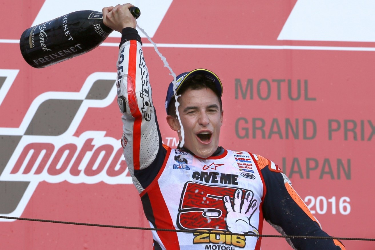 Marc Marquez celebrates his MotoGP victory in Japan - and the world championship.