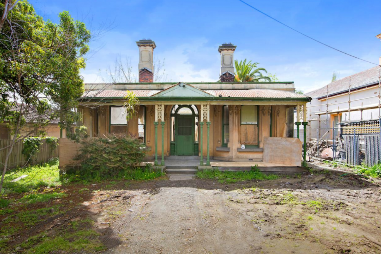 This rundown Hawthorn property fetched almost $3 million at auction.