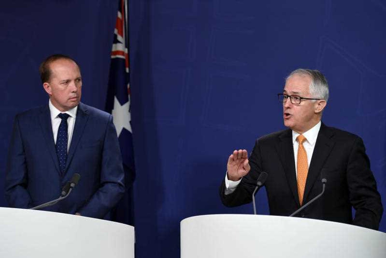 Immigration minister Peter Dutton and Prime Minister Turnbull are trying to do a deal with the US on refugees. Photo: AAP