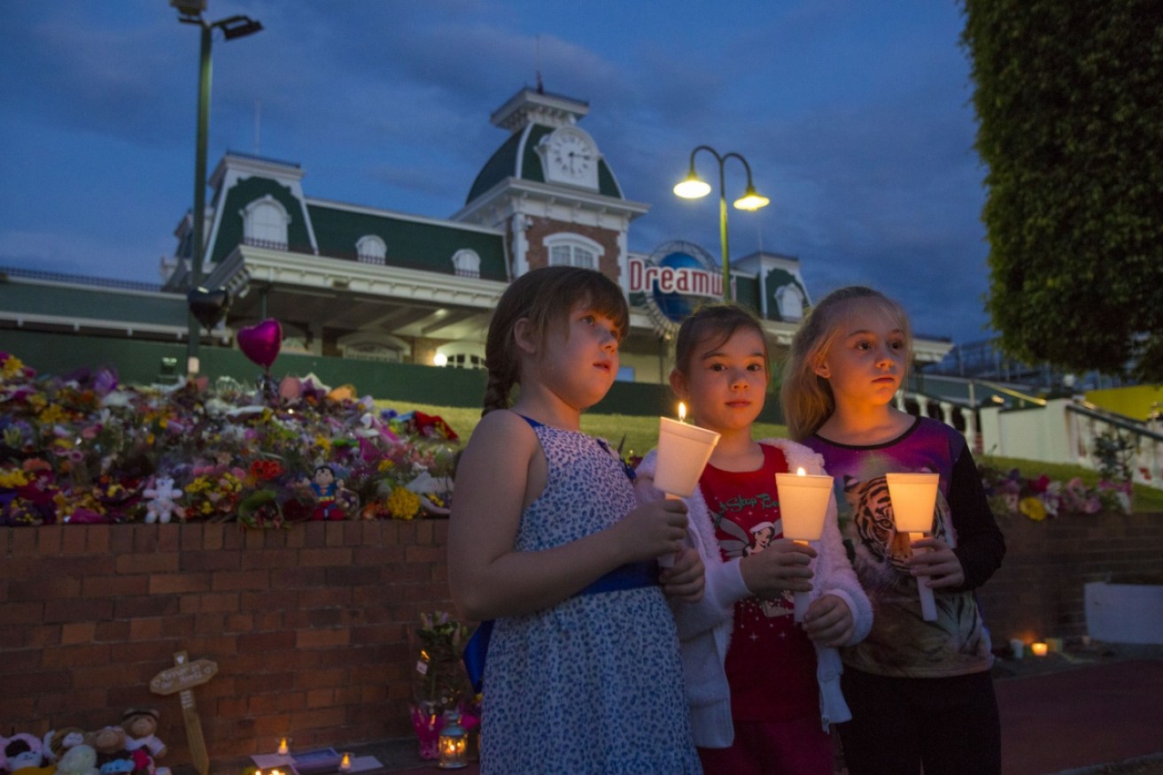 Mourners grieve for the victims of the amusement park tragedy in October 2016.