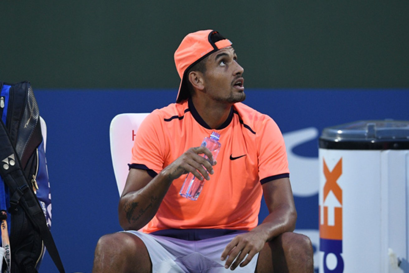 Kyrgios argues with the umpire in Shanghai. Photo: Getty