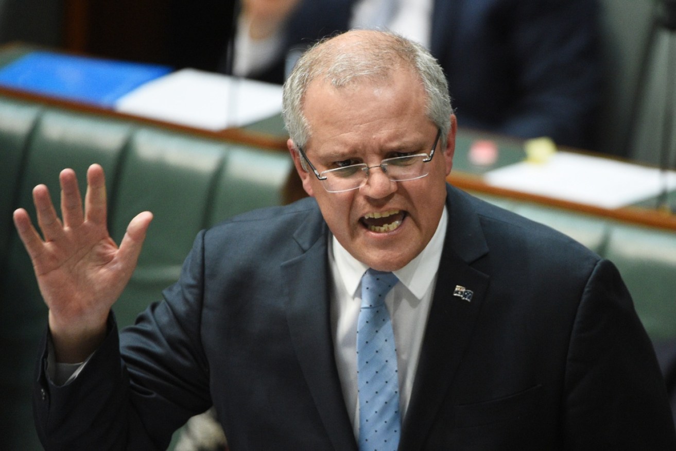 Australia is a "free enterprise country," Scott Morrison tells Federal Parliament.